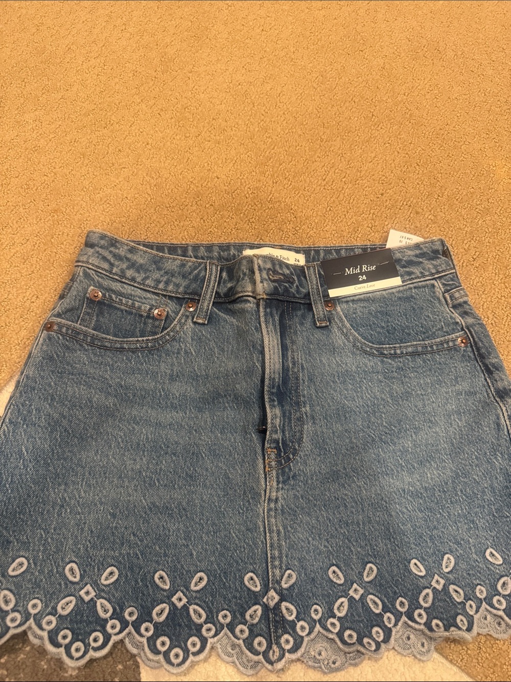 Mid Rise Blue Embroidered Hem Women’s Jeans Skirt